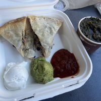 Black bean quesadilla and collard greens as our side-very good if they weren’t so salty. #Veganuary at Marty's Place in Charleston
