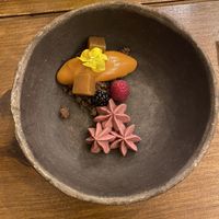 Chocolate covered in maguey purée, nixtamalized melon, Strawberry purée, berries  at Teocintle - Tika'aya in Oaxaca