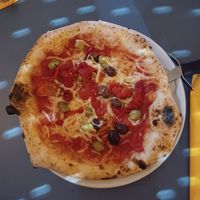 Vegan cheese, peppers, olives and tomatoes at Grumpy's Bar + Wood Fired Pizza in Farsley