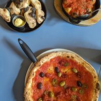 Greta, dough balls and potatoes at Grumpy's Bar + Wood Fired Pizza in Farsley