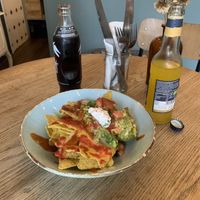 Entrance: tortilla chips with guacamole, vegan cheese and some sauce  at Zum Kleinen Esel in Bochum