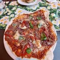 Pizza with marinated "beyond meat". at Vegan Vacation in Bergen