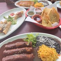 Classic mole, Yucca mole, Taquitos, complimentary chips   at Fiesta Oaxaca in Santa Fe