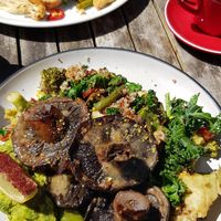 Mushroom without egg, added avocado. Vegan chilli hash in background. at Neighbours Cafe in St Kilda