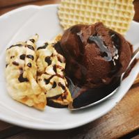 Warm apple dumplings with dark chocolate sauce and dark belgian chocolate ice cream at Mei Choi in Aachen