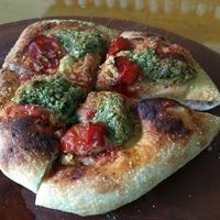 Pesto and cherry tomato pizza at Magic Monkey 悟空活菌茶 - WùKōng Huó Jūn Chá in Chishang