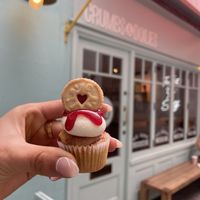 vegan thumb print mini cupcake (also have regular sized and other flavours) filled with fruit filling  at Crumbs & Doilies in London