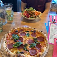 Best vegan salame pizza I’ve eaten! Hubby had a tofu salad. There were no readily available vegan pizza options in the menu, but you can choose the vegan toppings by yourself.  at Zilla in Vantaa