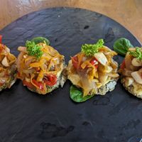 Crostini appetizer at La Masa Pizzería Conceptual in San Juan