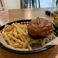 Vegan burger with fries at Korny Vibes in Houston