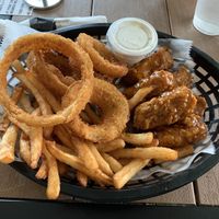 Vegan boneless wings with fries and onion rings  at Korny Vibes in Houston
