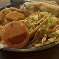 Munchie Box: fries, chick’n nuggets (4), burrito, tacos (2)  at Korny Vibes in Houston