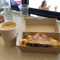 Latte with soy milk, strong and delicious. Mushroom truffle toastie    at Jumi's Cafe in South Yarra