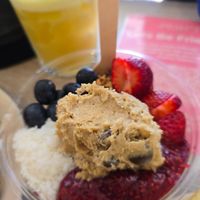 Acai bowl with berry and cookie dough at Jumi's Cafe in South Yarra