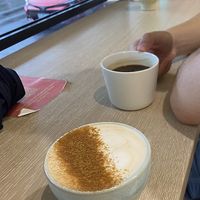 chai latte and long black   at Jumi's Cafe in South Yarra