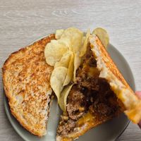 Philly cheesesteak toastie $19.00: exxy! especially as just a toastie w/fable meat, cheese, and a sweet/salty sauce at Jumi's Cafe in South Yarra