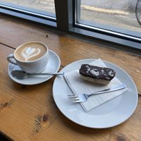 Flat white and vegan bounty bar  at Groundstate Coffee in Dublin