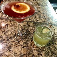 Cocktail specials. The “forbidden sour” pomegranate liqueur, sour mash whiskey, lemon juice, cane syrup with sparkling wine on top. Epic margarita with cucumber shrub and tequi at La Locanda Ristorante Italiano in Scottsdale