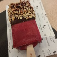 Cherry popsicle + dark chocolate + hazelnuts at Loco Polo in Sevilla