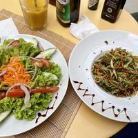 Pesto pasta and fresh and crispy salad at Canoa in Rio De Janeiro