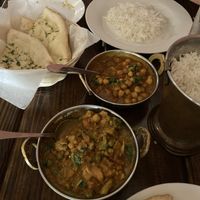 Channa masala, vegan (front), vegetable chettinadu, vegan (middle), with basmati rice and naan bread at Tikka Bar in Key West