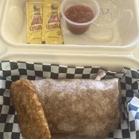 Sausage, “egg” and cheeze breakfast burrito with extra hash brown and salsa   at Birch Cafe in Highland Heights