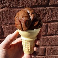 When Cherry Met Chocolate (V, DF, GF) - dark chocolate sorbet w/ chocolate flakes & a cherry swirl at (402) Creamery in Lincoln