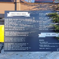 Large sign with menu outside at Cookie Café Mossettes in Les Crosets Val-dilliez
