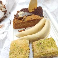 Cakes, almond empanadas,  sweet filo pastries at Nujaila in Granada