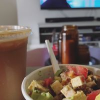 Avocado breakfast bowl with Beanarella iced coffee  at Life - The Vegan Drive Thru in Cape Coral
