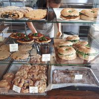 The sign says if it's vegan vegetarian or nor at Bread House in Torun