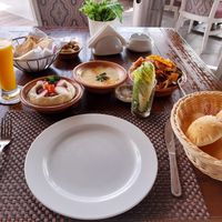 Hummus with falafel, tahini, & fattoush at Sidra By The Citadel in Alexandria