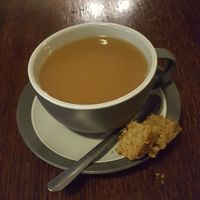 Tea with almond milk (and tiny pieces of vegan flapjack) at Thingy-ma-jigs in Guisborough