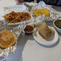 Aloo burger, tempura, noodle samosa, sarson da saag at Namdhari's Punjabi Spice Restaurant in Surrey