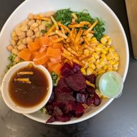 Poke bowl with vegan salmon and ponzu sauce at Poké Perfect - Nieuwendijk in Amsterdam