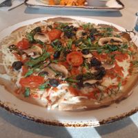 Vegan pizza at Naked and Sated - Estébanez Calderón in Madrid