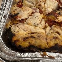Burnt lasagna that she said this is how vegan cheese melts  at Ariela's Pizza & Kosher Kitchen in Las Vegas