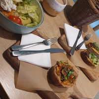 Nuts bowl, bruschetta, and quiche at Pilligreen in Minsk