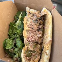 Vegan jackfruit cheesesteak- delicious, flavorful, with a side salad that’s included  at Naked Lunch in Philadelphia