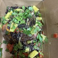 Sweet potato packed with so many fresh healthy toppings 🙌🏽  concoctions of the toppings definitely compliments the sweet potato in a unique way it surprised me, very good  at Naked Lunch in Philadelphia