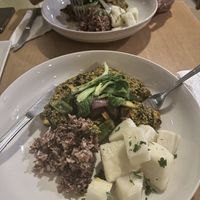 Egusi with boiled yam and brown rice  at Tatale Vegan Restaurant in Accra