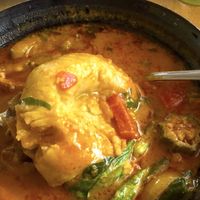 Fufu in the rich creamy gravy consisting  at Tatale Vegan Restaurant in Accra