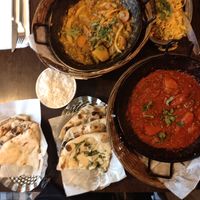 Vegetable Madras, Vegetable Dhansak, two types of rice and naan at Archana in Belfast