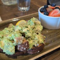 Avocado toast with a side of fruit at First Watch in Jacksonville