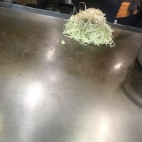 Okonimyaki in making  at Teppei in Hiroshima