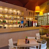 The bar and some seats at Modrý Zub - Jindřišská in Prague