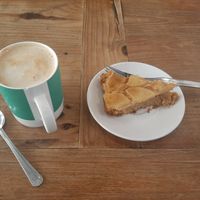 Pineapple cake with latte at Zero Waste Hub in Edinburgh