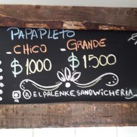 Papapleto es un completo que lleva papas fritas a cambio de vienesa. at El Palenke Sandwicheria in Santiago