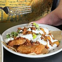 Loaded soyrizo, queso and sour cream hashbrowns at 4th & State in Columbus