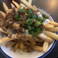 Small loaded fries with a couple bites taken😝  at 4th & State in Columbus